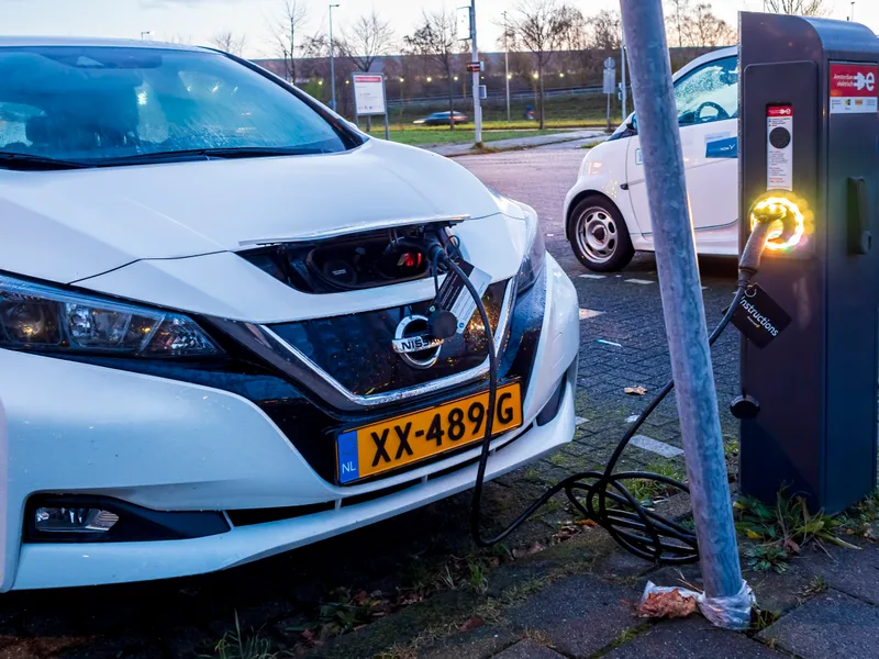 Electric car plugged into a Level 2 charger